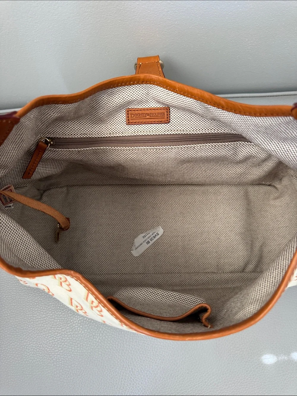 DOONEY & BOURKE CREAM TAN CANVAS LEATHER DB LOGO LOCK HOBO CRESCENT SHOULDER BAG